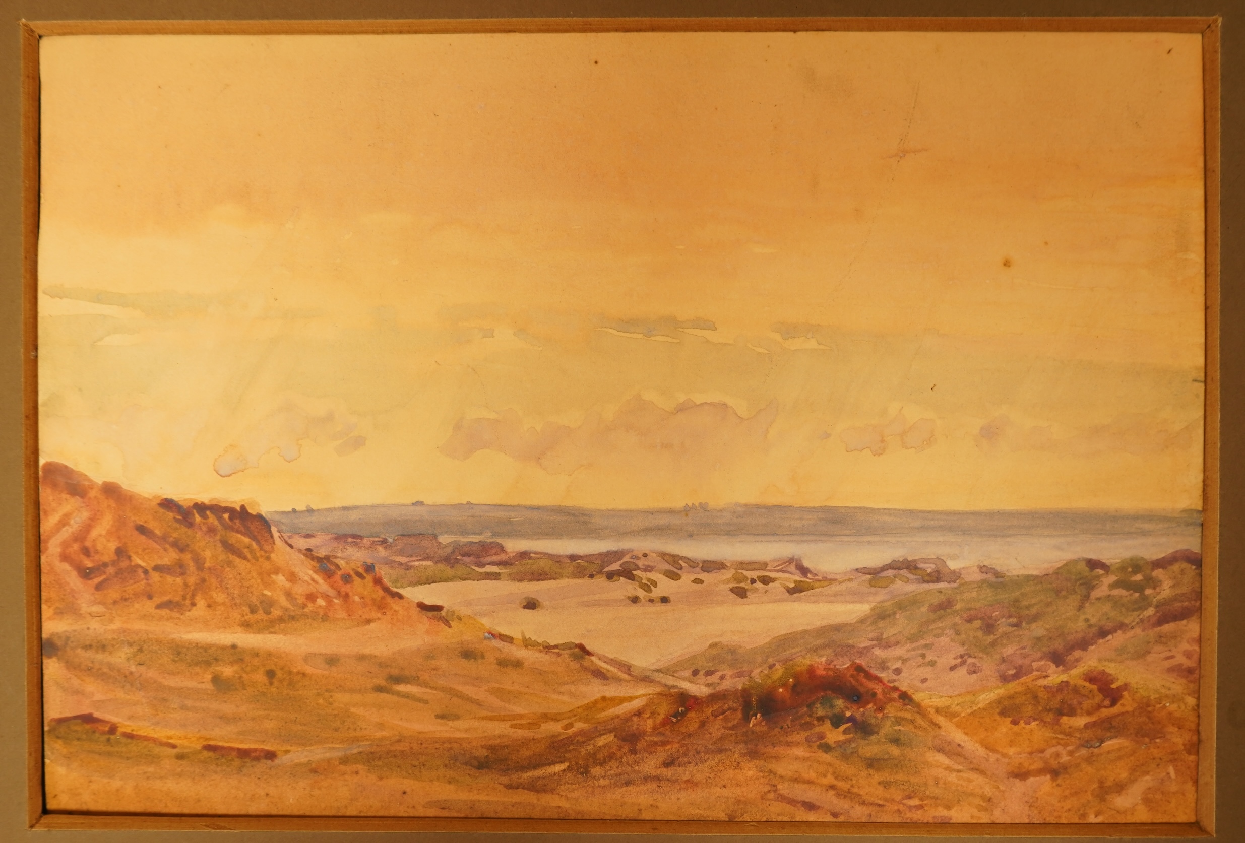 John William Schofield (1865-1944), a collection of six watercolours and pastels to include landscape with castle beyond, coastal views and street scene with cottages, most signed, together with an oval pastel portrait o